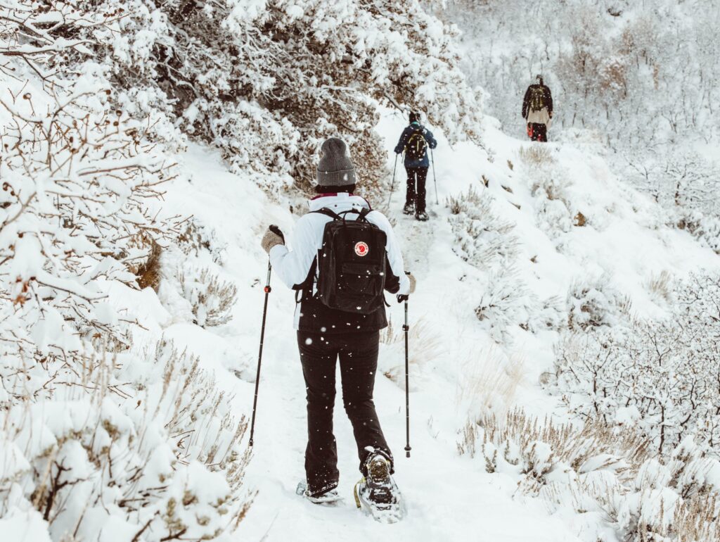 Snowshoeing on a snow covered trail. Credit: Taylor Brandon