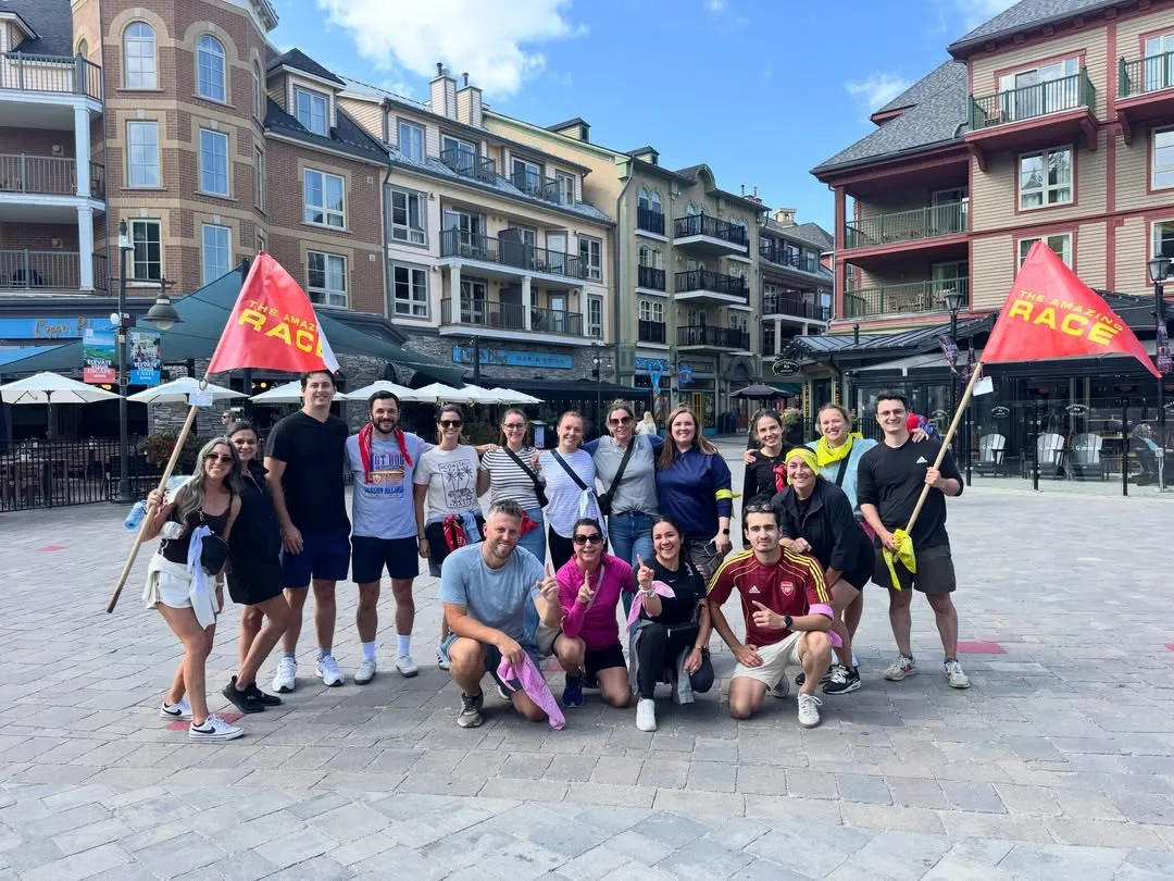 A corporate team at the finish of an Amazing Race in Blue Mountain Village with Free Spirit Tours